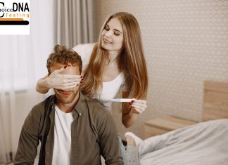 Understanding the Pros and Cons of DNA Paternity Testing Lab technician handling a DNA paternity test sample