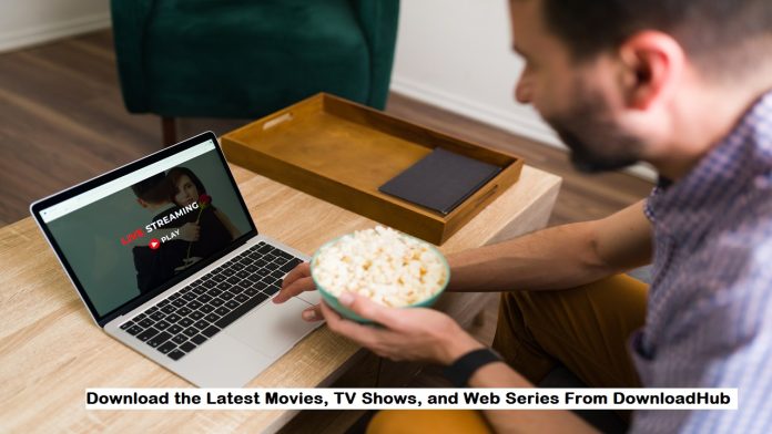 a man watching web series in laptop